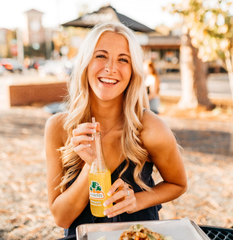 Brand ambassador enjoying a drink near the University of Maryland