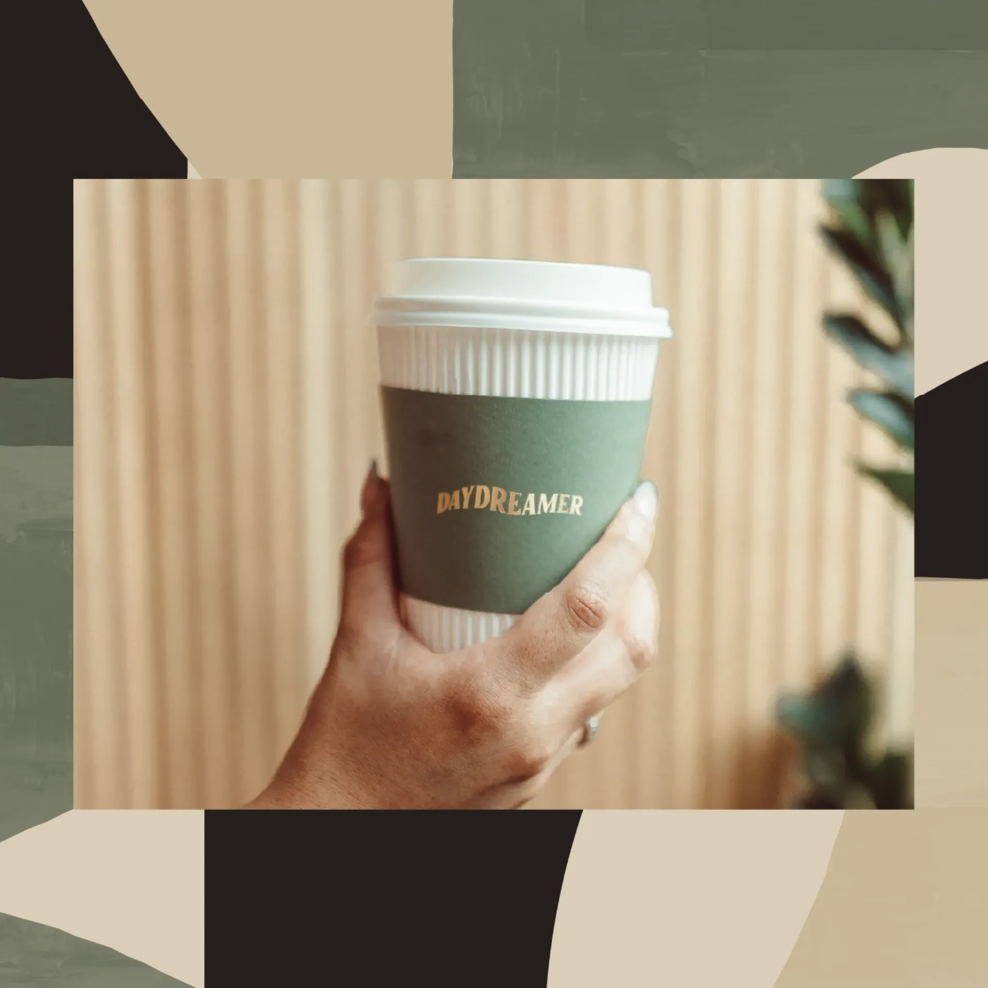 A Daydreamer coffee cup at the Rambler College Park North café