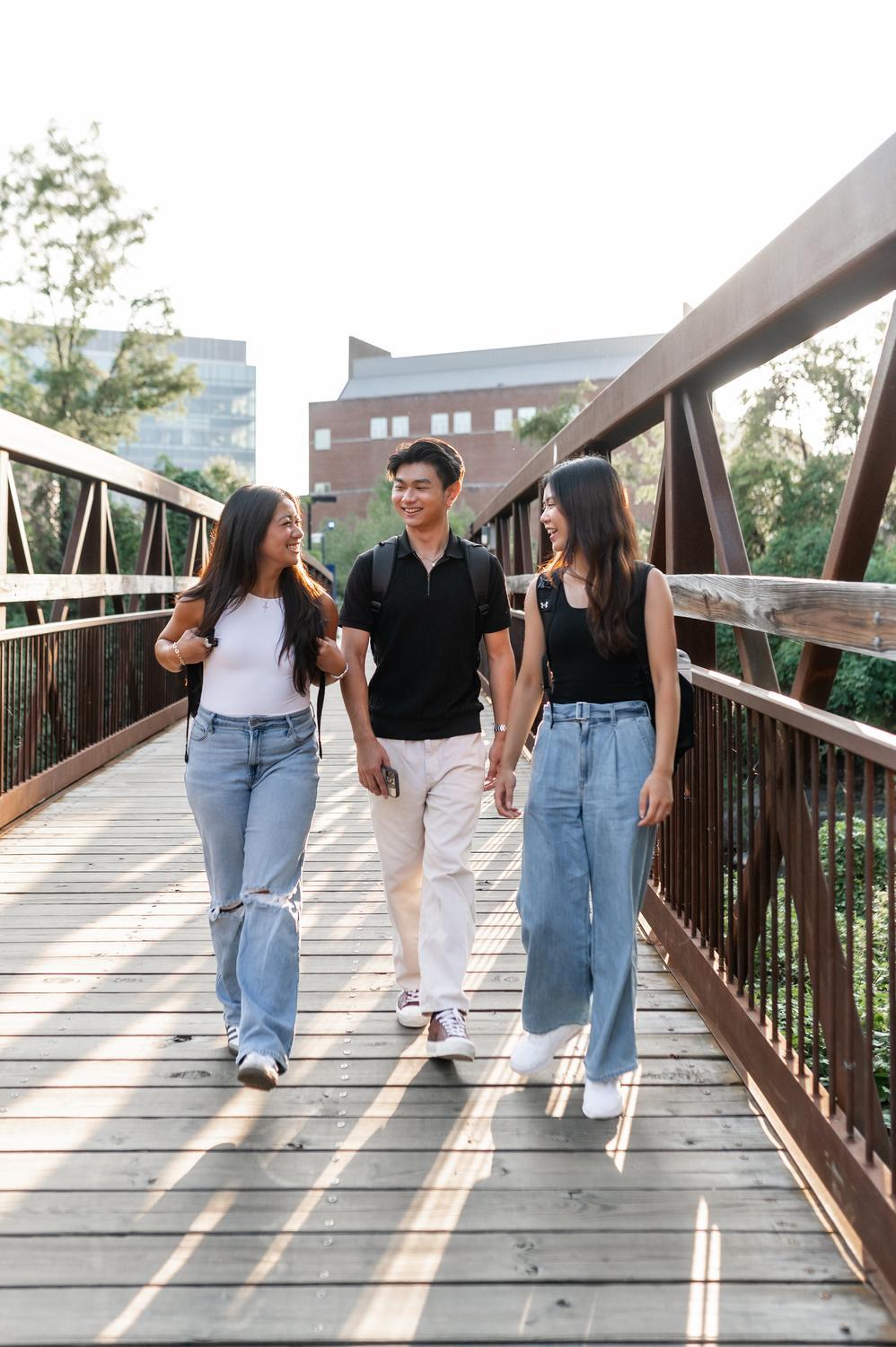Students crossing a footbridge near the University of Maryland