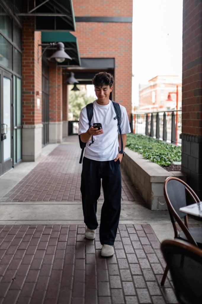 Student walking to class on UMD campus.