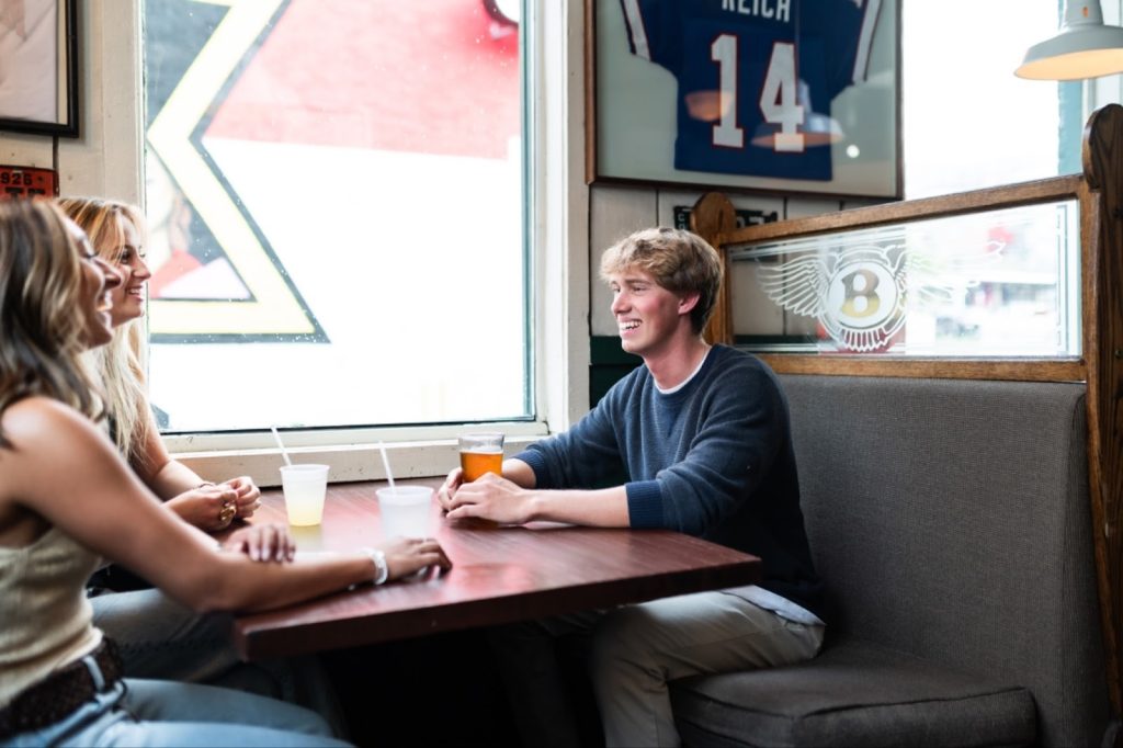 Students chatting at RJ Bentleys, a popular UMD bar.