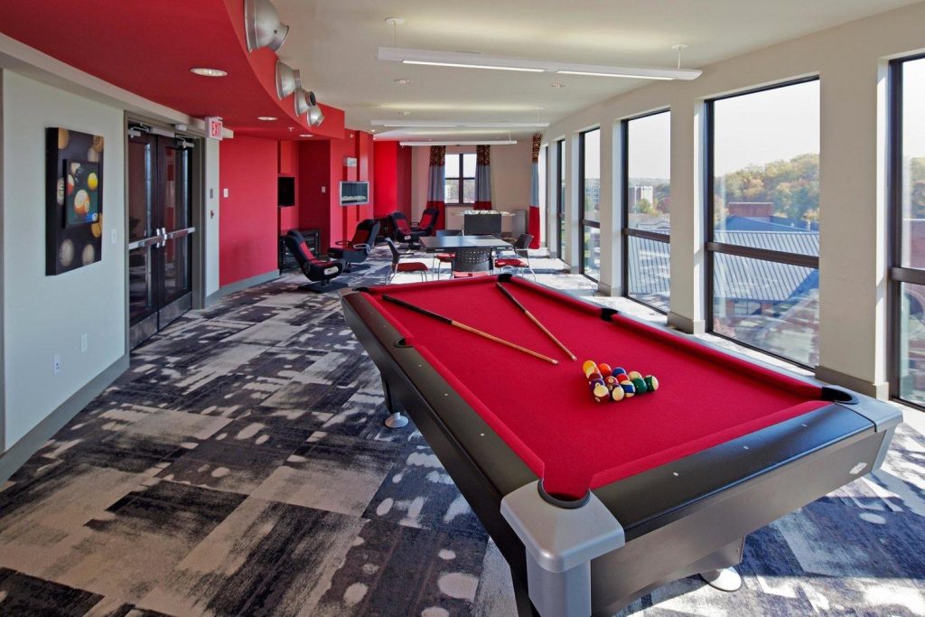 Rendering of communal lounge with pool table at The Varsity.