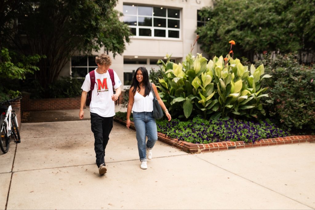 Students walking outside Robert H. Smith School of Business at UMD.