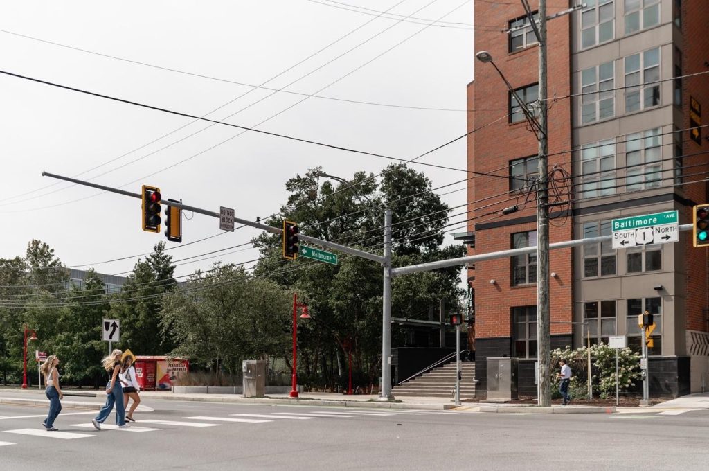 Students walking along Baltimore Avenue, near UMD campus. 
