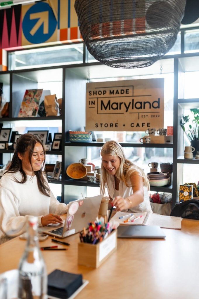 Students doing a group project in Shop Made in Maryland Café.