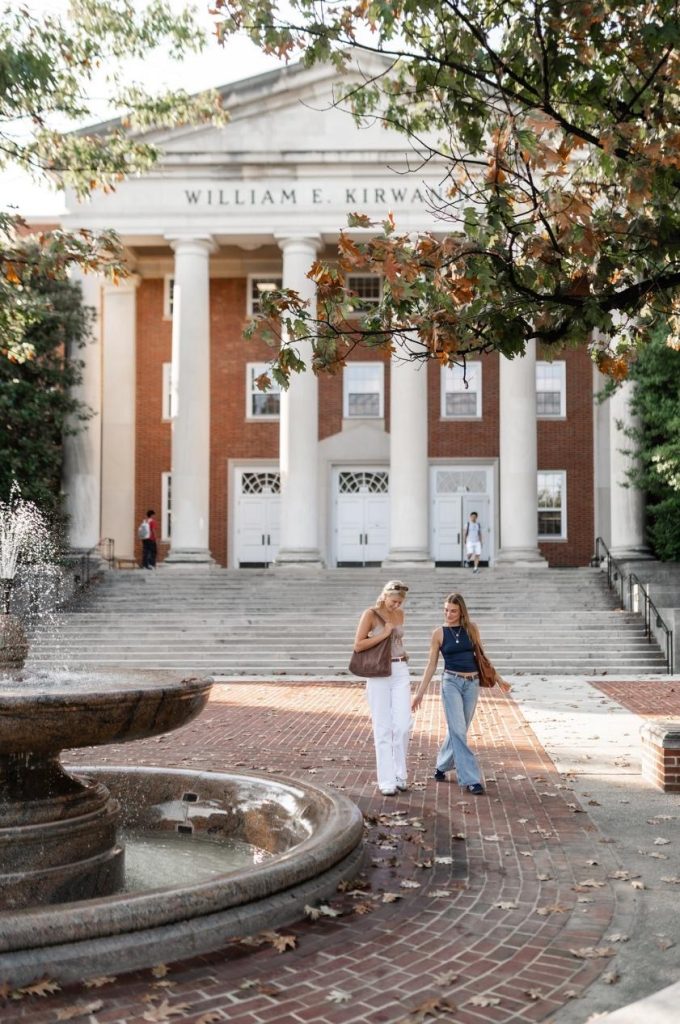 Students walking outside of William E. Kirwan Hall on UMD Campus. 