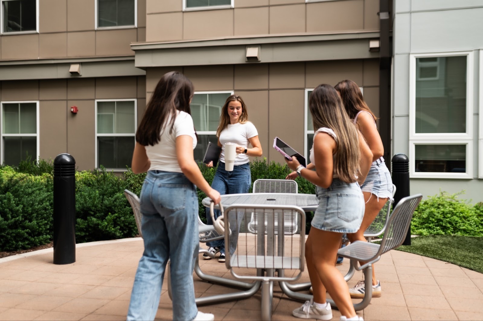 University of Maryland students gathered outside at an off-campus apartment in College Park.