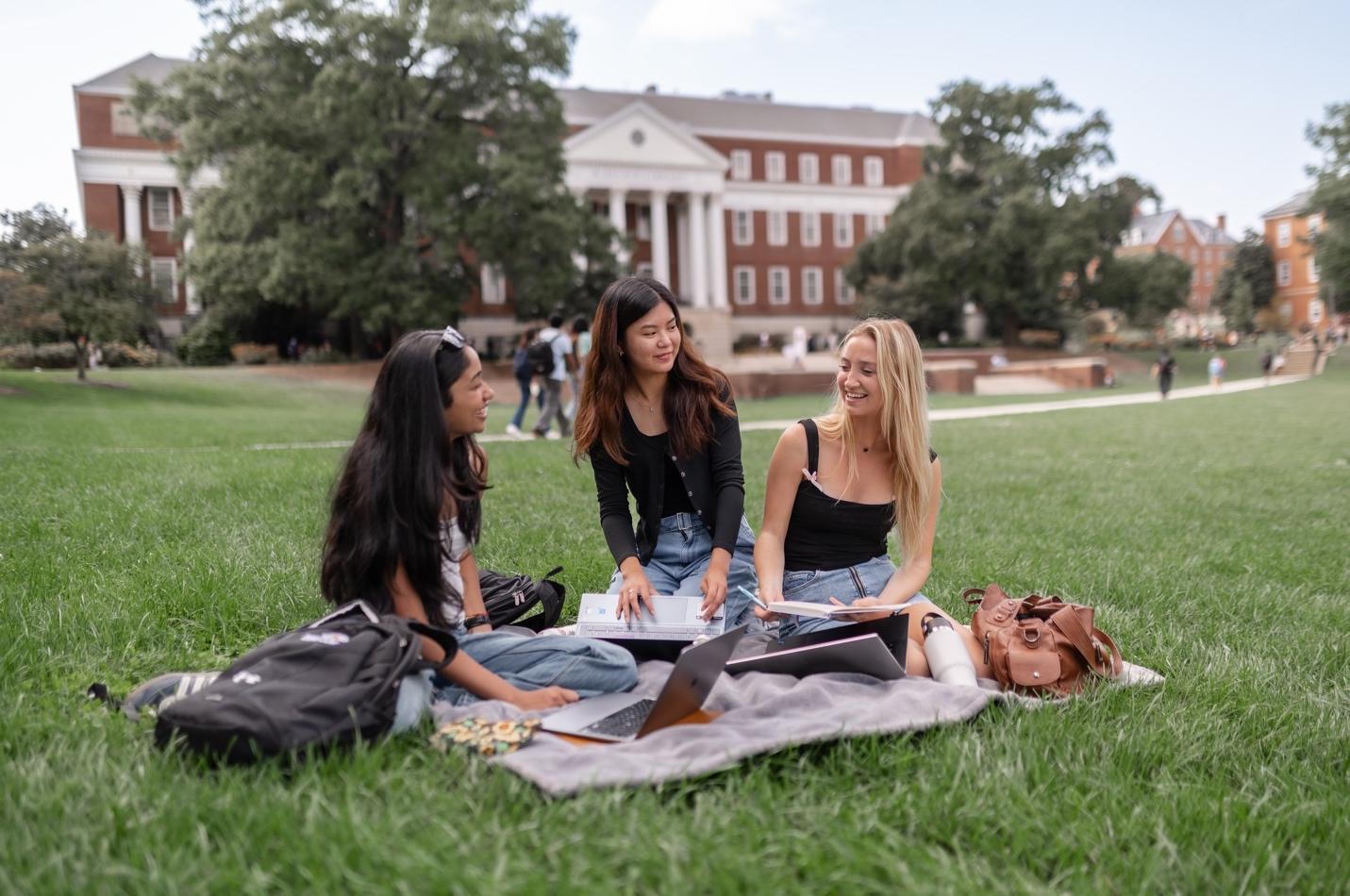 Students studying on McKeldin Mall, a popular spot on UMD campus.