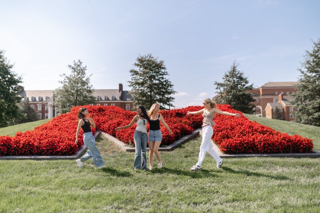 Students gathered around the 'M'.