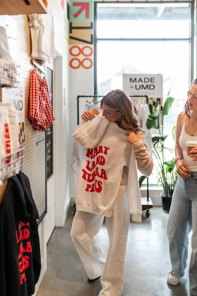 Students viewing items at ShopMade in Maryland in College Park. 