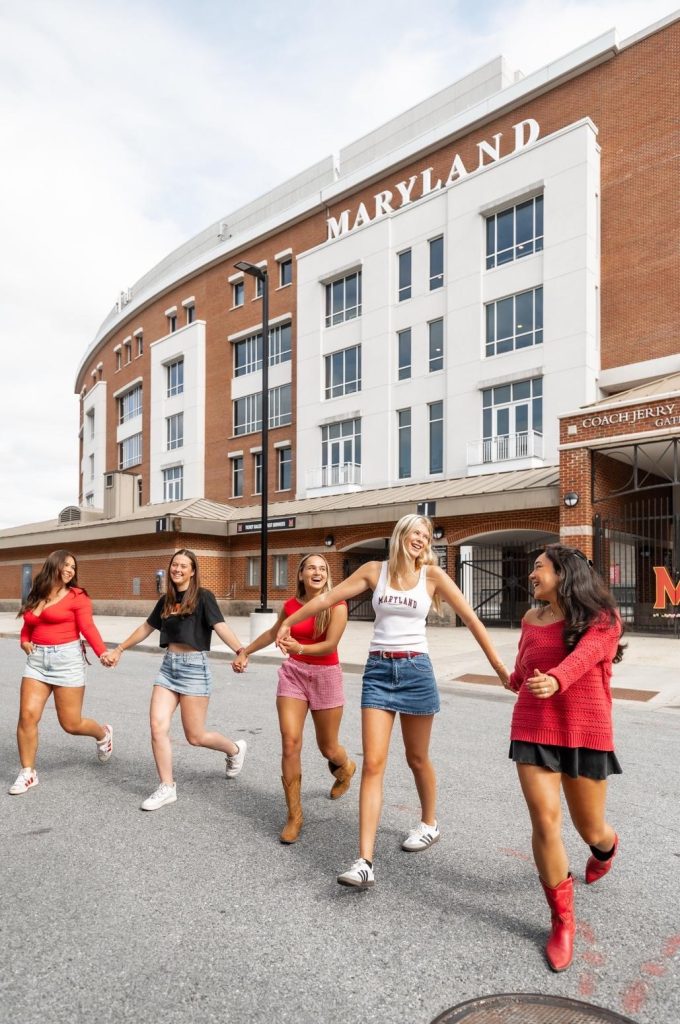 Students outside of SECU Stadium on UMD campus.