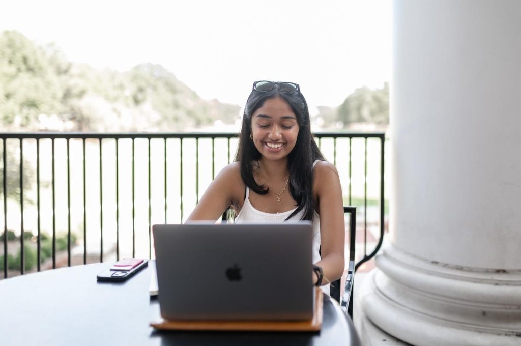 Student studying at McKeldin Mall on UMD’s campus.