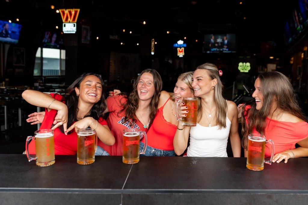 Students spending time at Cornerstone, a popular bar on campus. 