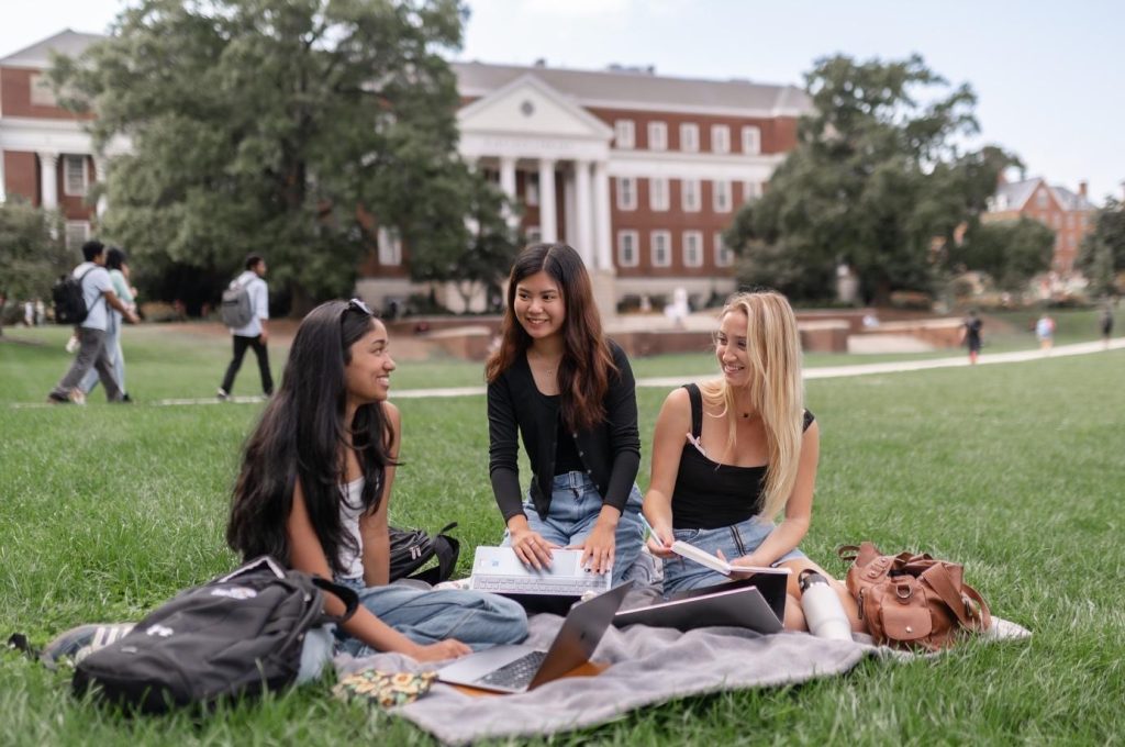 Students hanging out on McKeldin Mall on UMD’s campus. 