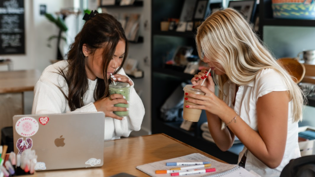 UMD students sip their coffees together off campus in College Park.