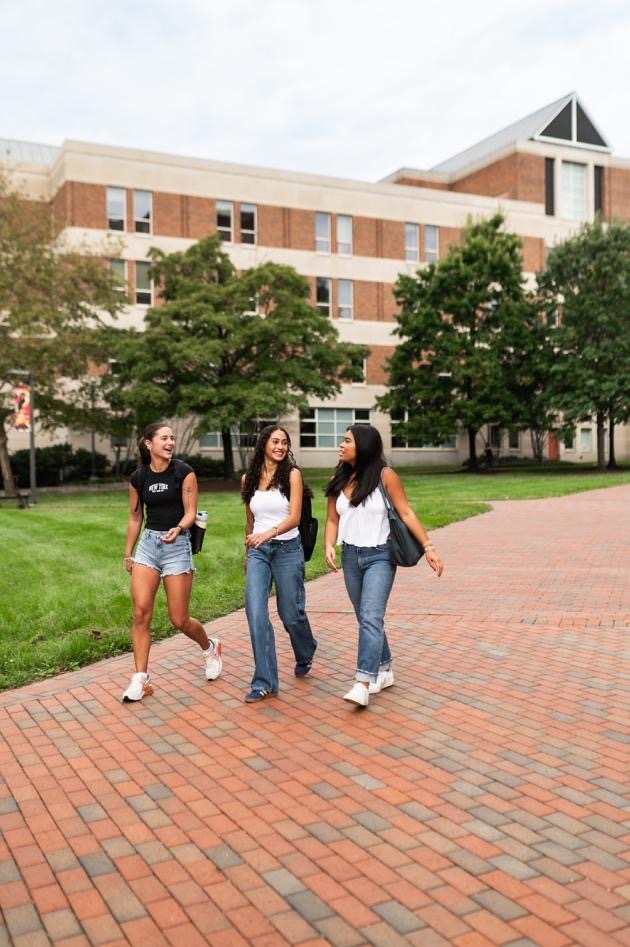 Students walking near Robert H. Smith School of Business.