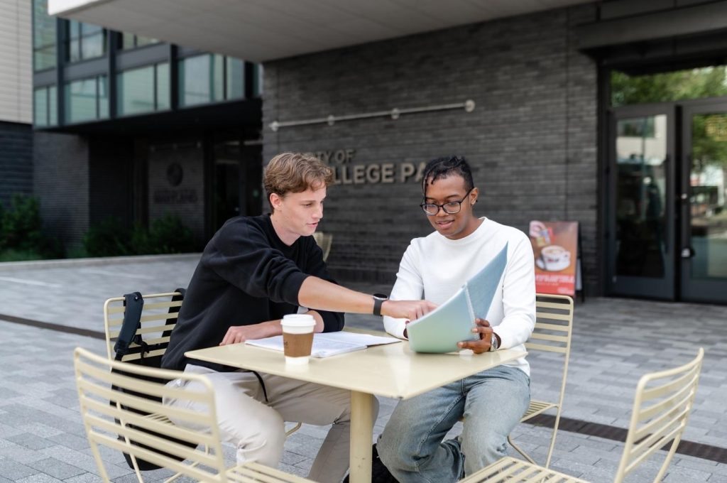 Students studying together outside of a café near UMD campus.