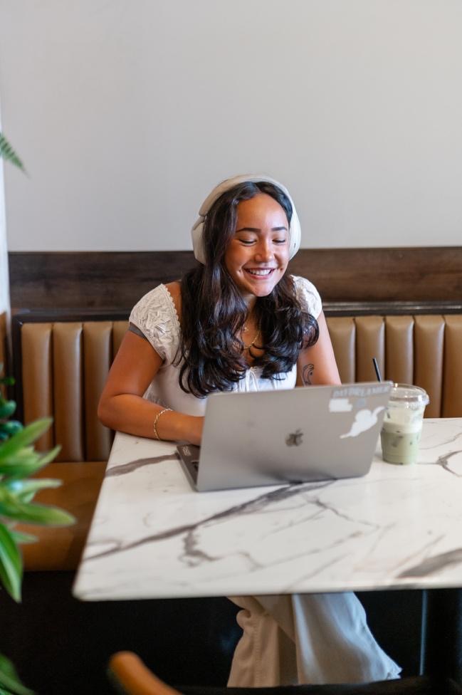 Student studying in a café near campus. 
