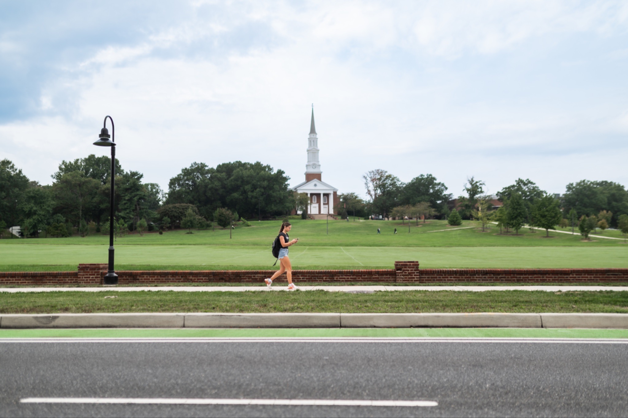 Student walking on campus. 