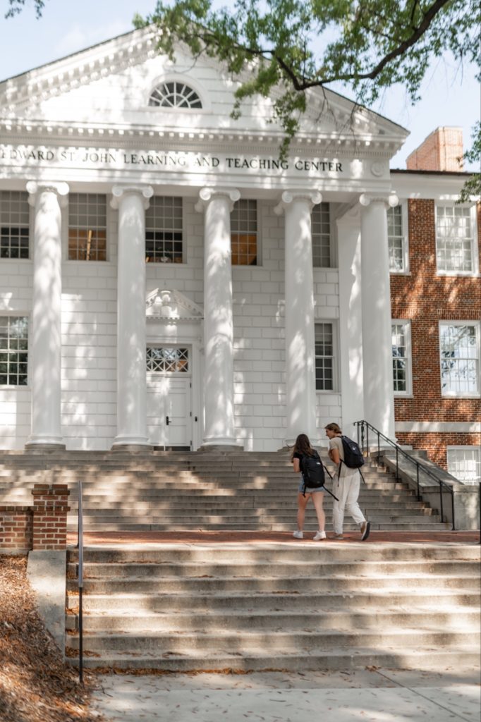 Students walking to Edward St. John Learning and Teaching Center at UMD.