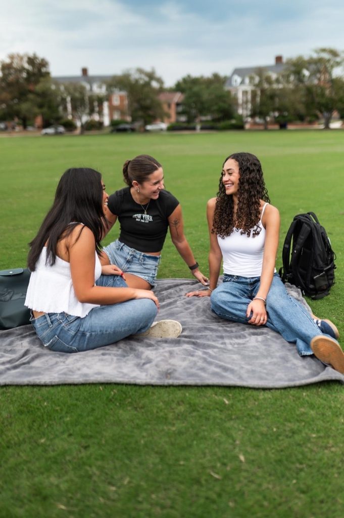 Students spending time together on Fraternity Row in College Park. 